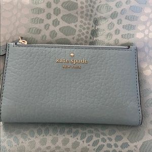 Kate Spade small slim bifold leather wallet.